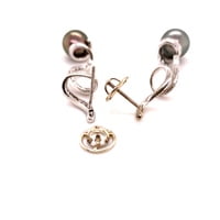 Unique Tahitian Cultured Pearl and Diamond Earstuds in 18 Karat White Gold Unique Tahitian Cultured Pearl and Diamond Earstuds in 18 Karat White Gold
