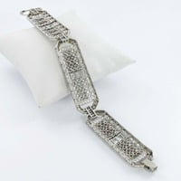 Magnificent Emerald and Diamond Platinum Art Deco Bracelet