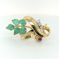 Gübelin Retro Brooch in 18 Karat Gold with Emeralds, Diamonds, and Ruby