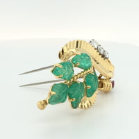 Gübelin Retro Brooch in 18 Karat Gold with Emeralds, Diamonds, and Ruby